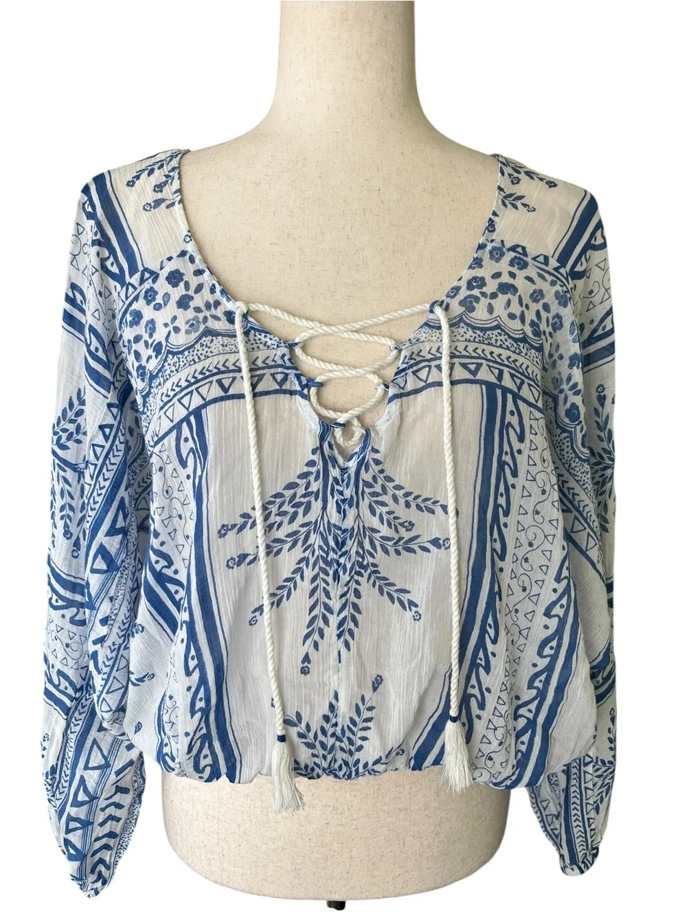 Free People boho top featuring a blue and white geo-paisley print
